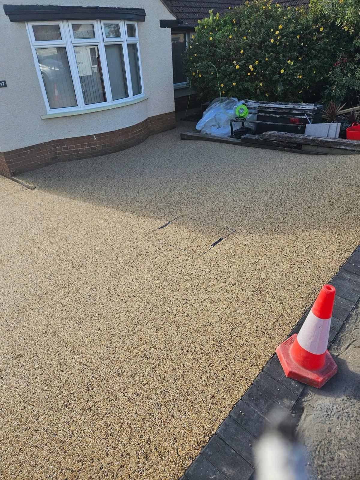 Golden resin-bound driveway after installation in Bridgend