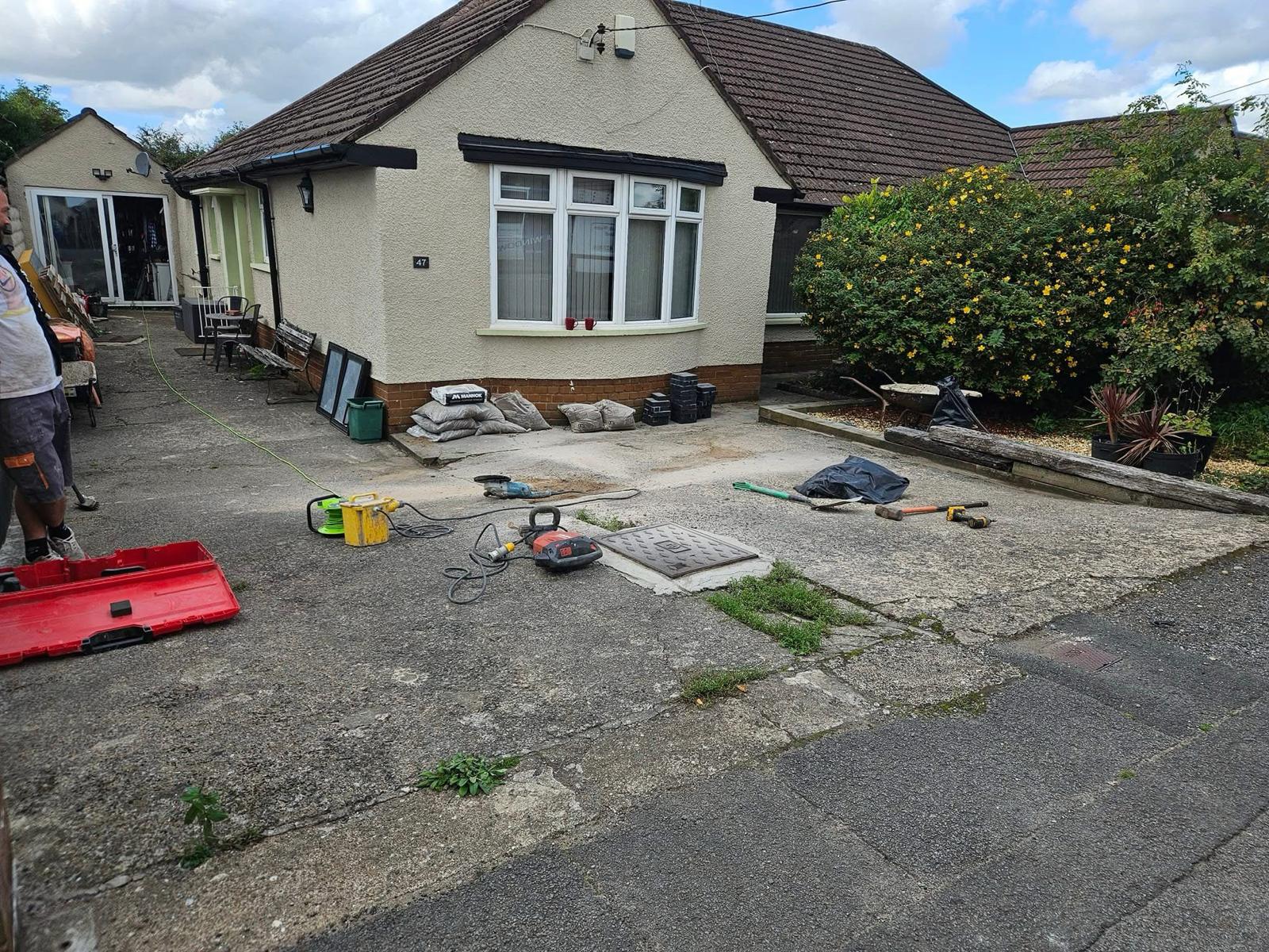 Cracked concrete driveway before resin installation